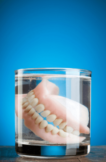 dentures in a clear jar