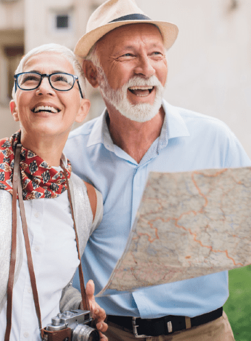 Couple Smiling With Dentures 3 - Changing Smiles Denture & Implant Center, Bend Oregon